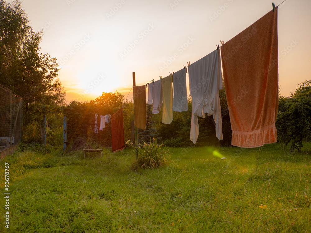 Fototapeta premium White laundry is drying outside