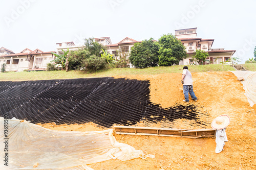 Tablou canvas Slope erosion control with grids and earth on steep slope
