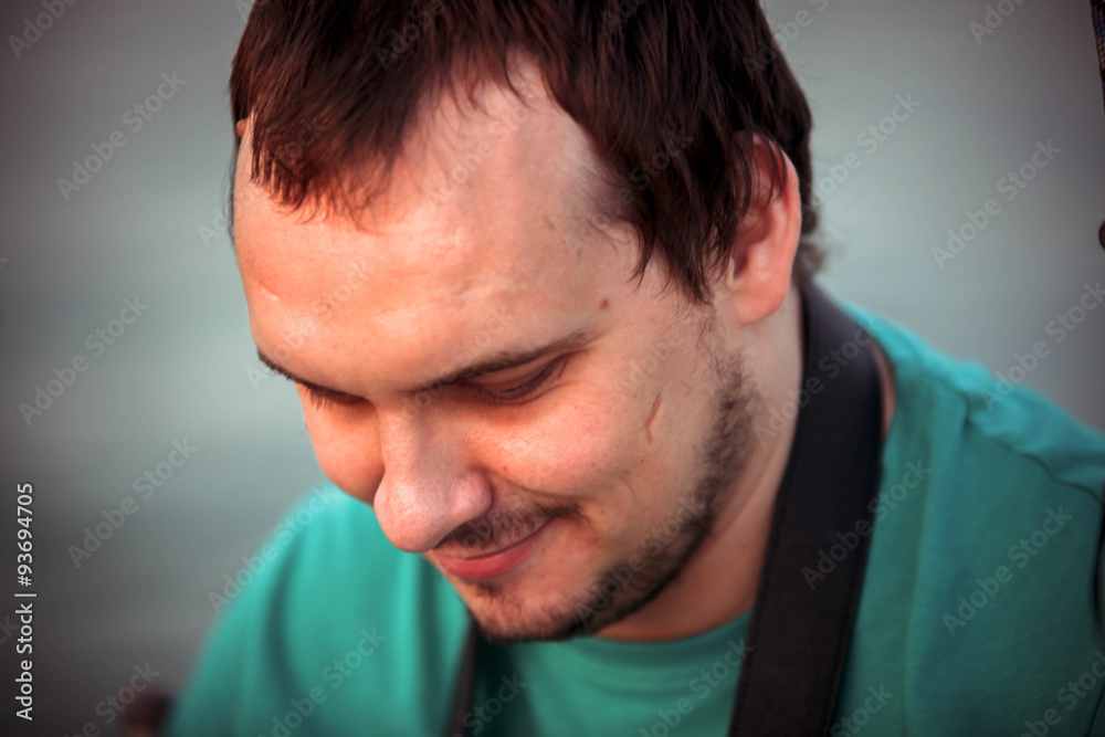 Obraz premium Handsome young man relaxing on a yacht, blue summer vacation 