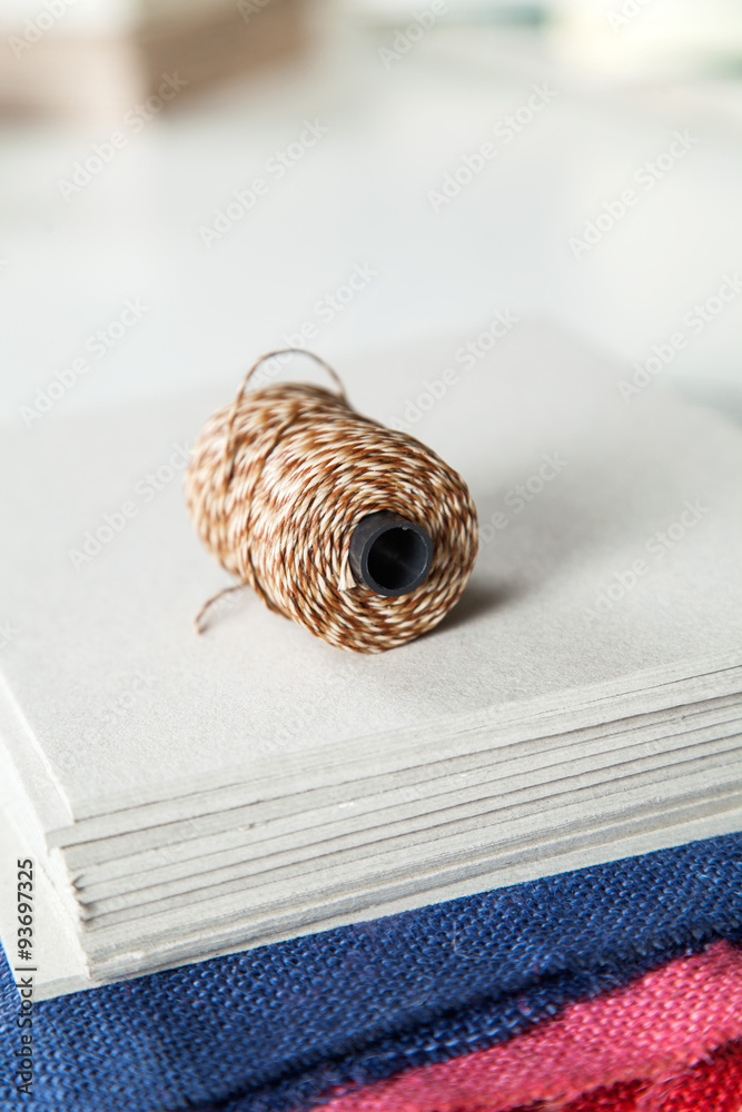 Obraz premium Thread On Papers In Factory