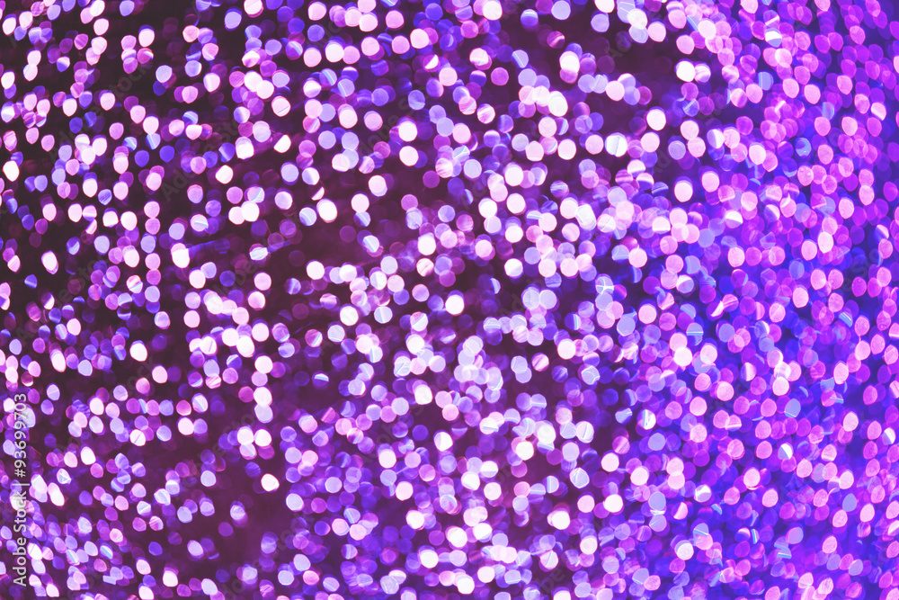 Abstract festive lilac bokeh background with different densities