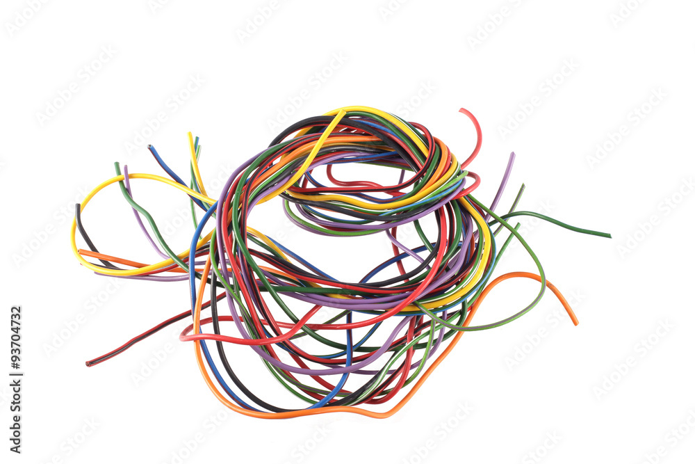 Close up photo of multicoloured wire on a white background. Close up photo of multicoloured wire on a white background.