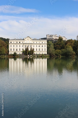 Leopoldskron Palace in Salzburg, Austria, Europe, with fortress Hohensalzburg in the background. The Palace was film location for the Musical Sound of Music with Julie Andrews.