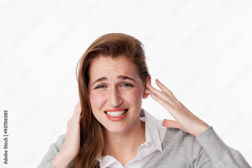 20s woman irritated by loud music or tinnitus problems 20s woman irritated by loud music or tinnitus problems