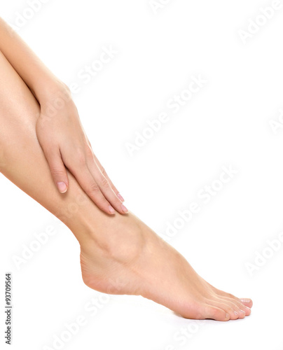 woman legs isolated on white. Depilation or another healths concept