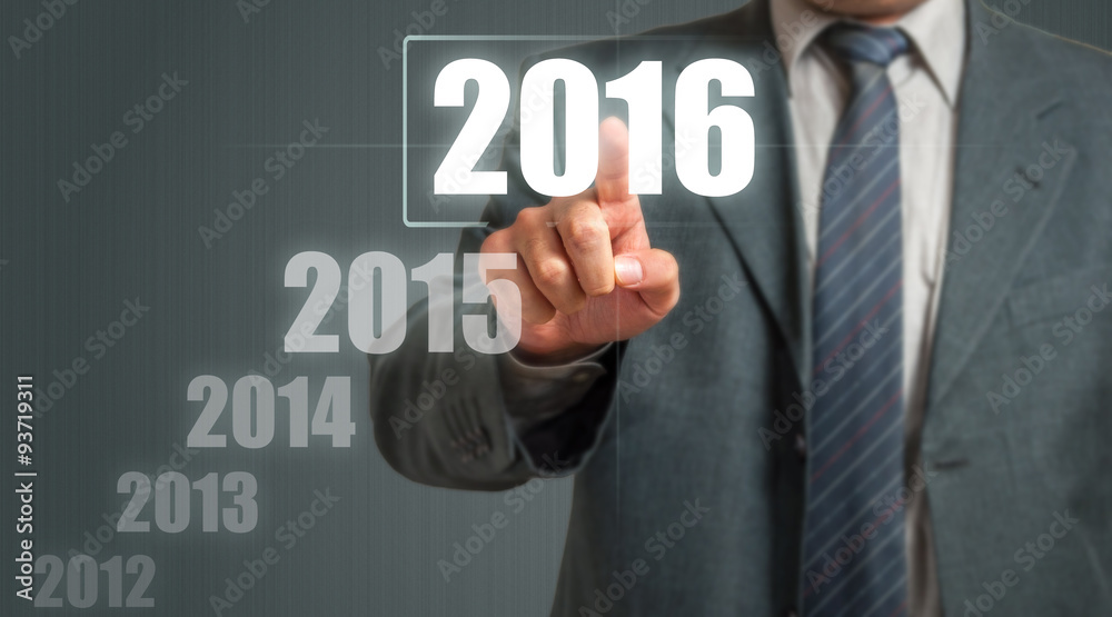 Business Man Touching An Imaginary Screen And Choosing 2016 Year Business Man Touching An Imaginary Screen And Choosing 2016 Year