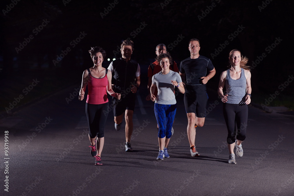 people group jogging at night
