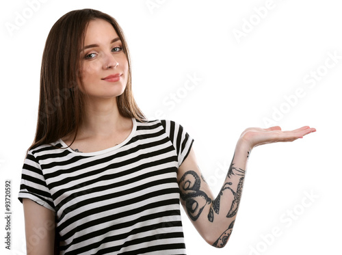 Young woman with tattoo isolated on white