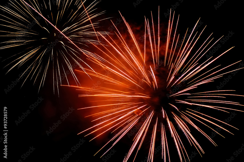 Sparks of fireworks against the black sky Sparks of fireworks against the black sky