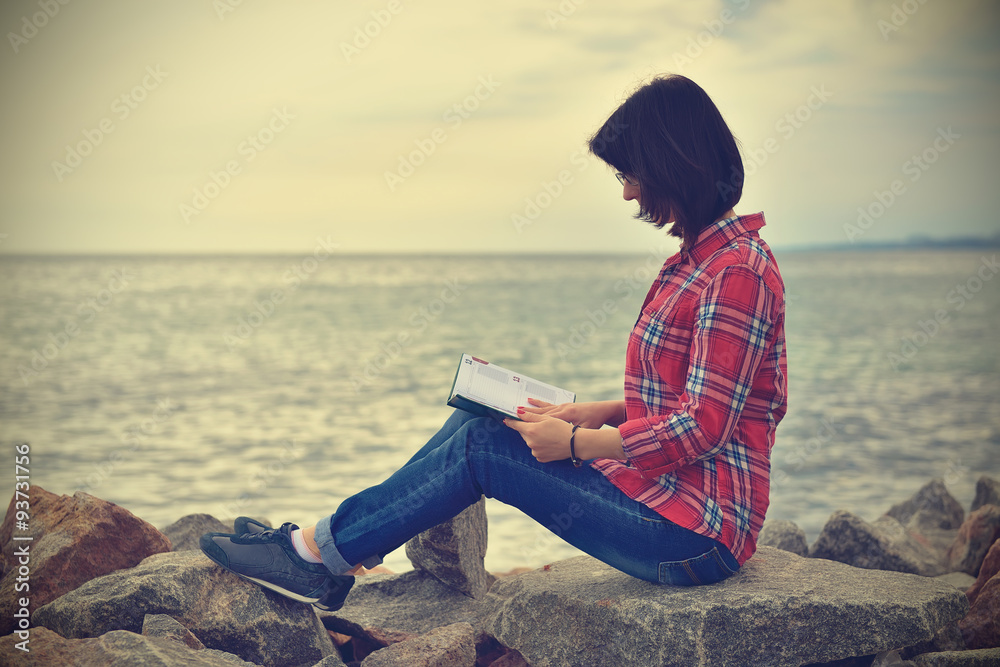 hipster girl reading a book