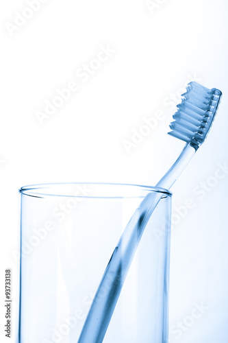 tooth brush in glass  on white background..