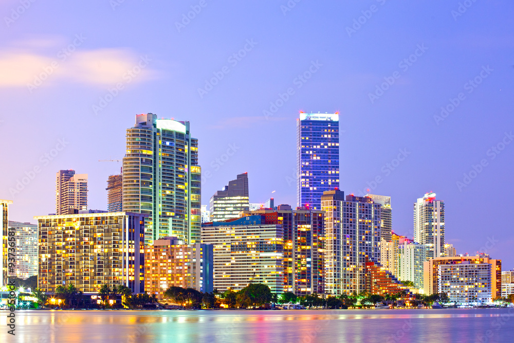 Fototapeta premium Miami Florida at sunset, colorful skyline of illuminated buildings