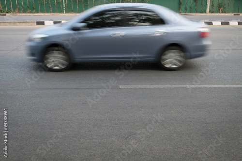car fast motion blurred driving on road © sutichak
