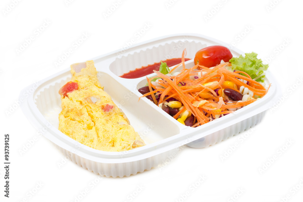 Omelette with fresk salad in white plastic box. Omelette with fresk salad in white plastic box.