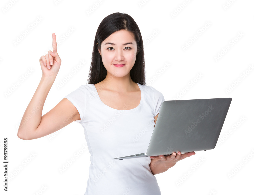 Asian woman use of the noteboook computer and finger point up Asian woman use of the noteboook computer and finger point up