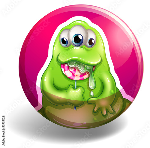 Green monster eating lolipop