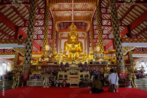 golden buddha statue in wat suan dok temple, chiang mai, thailand