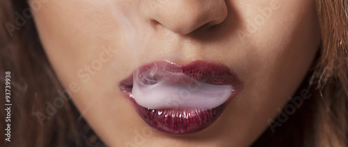 Sexy woman smoking closeup letterbox