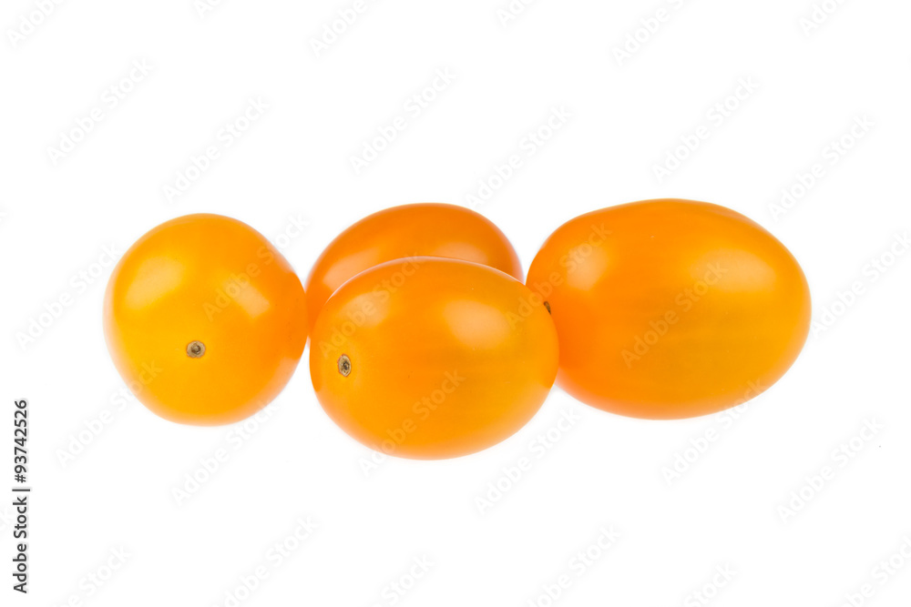 Yellow cherry tomatoes on white background Yellow cherry tomatoes on white background