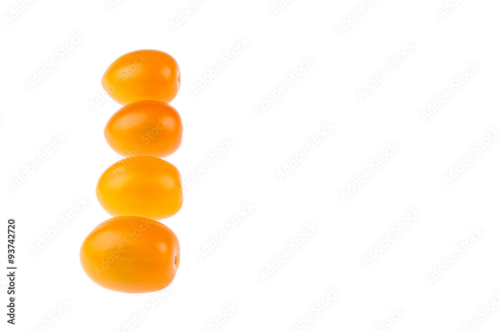 Yellow cherry tomatoes on white background Yellow cherry tomatoes on white background