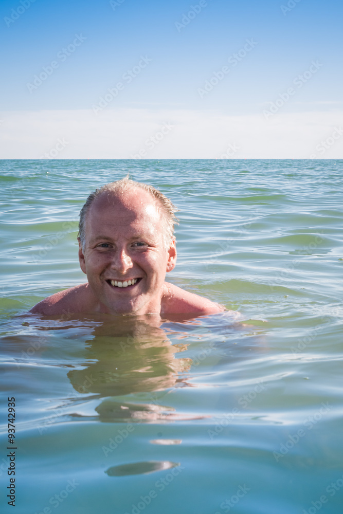 Man swimming in ocean