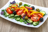 Salad with tomato, cucumber and olives