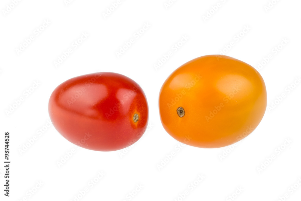 Yellow and red cherry tomatoes on white background Yellow and red cherry tomatoes on white background