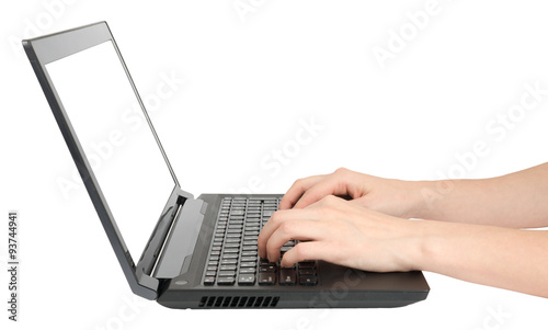 Humans hand working on laptop