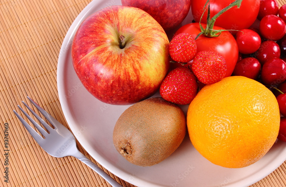 Fresh fruits and vegetables on plate, healthy nutrition Fresh fruits and vegetables on plate, healthy nutrition