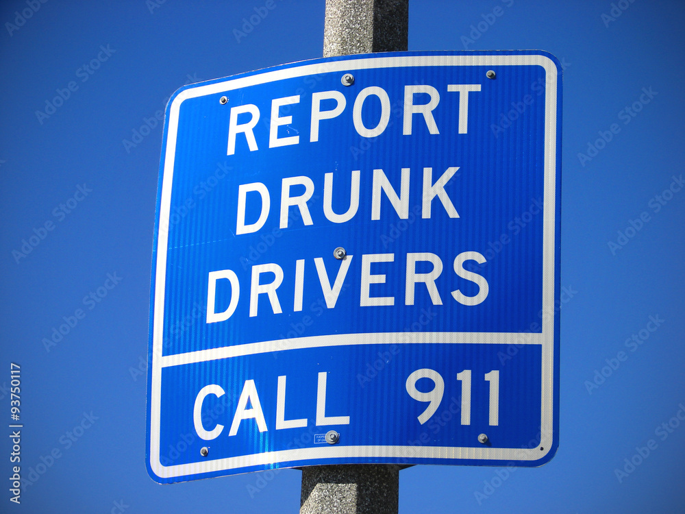 report drunk drivers sign with blue sky