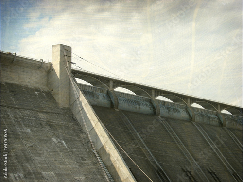 Photos aged and worn vintage photo of grand Coulee dam from below