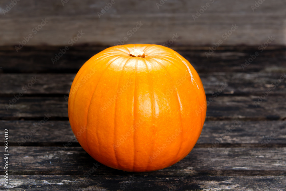 Fresh Pumpkin on old wooden table. Fresh Pumpkin on old wooden table.