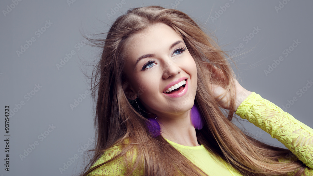 Fototapeta premium Portrait of a beautiful smiling woman