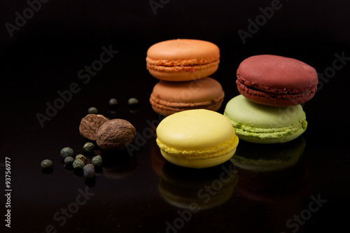 Macaroons on black surface photo