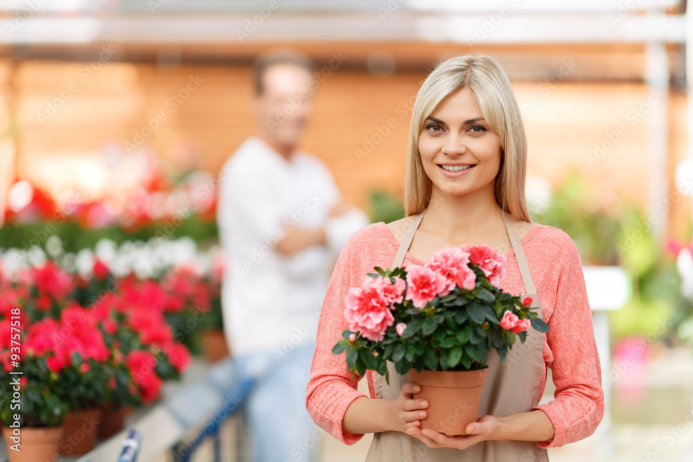 Professional florist selling flowers 