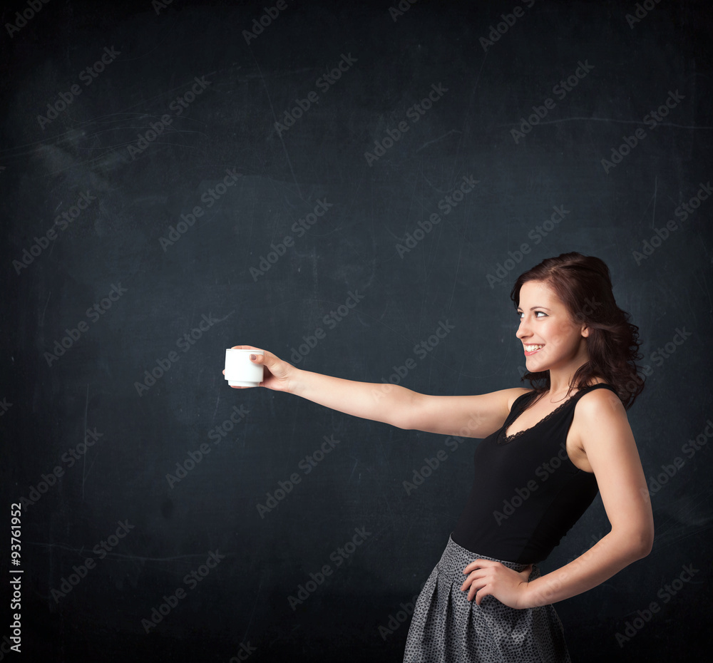 Businesswoman holding a white cup