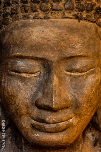 Face front of stone Buddha
