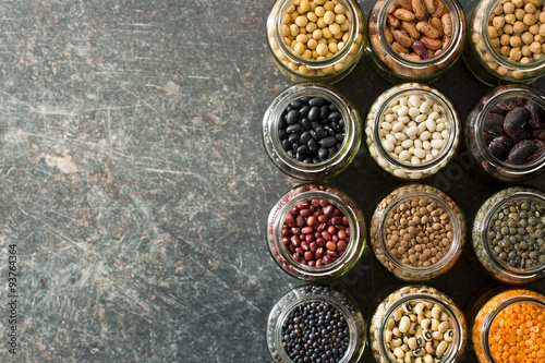 various dried legumes in jars