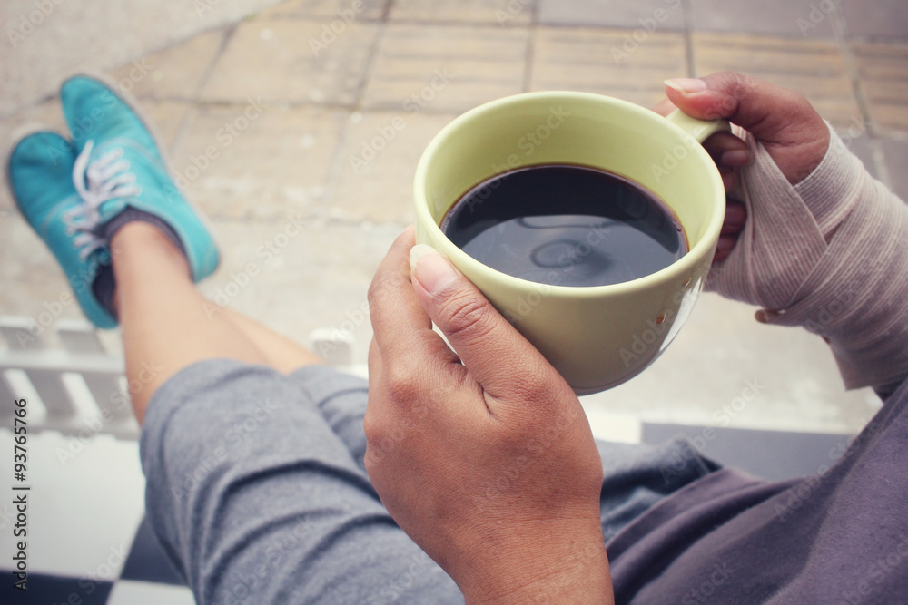 Bandage hand with coffee cup