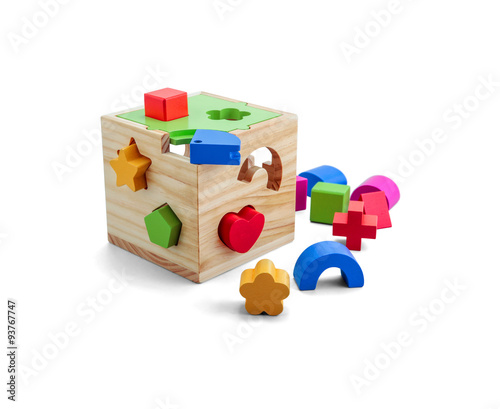 Wooden puzzle toy with colorful blocs isolated over white