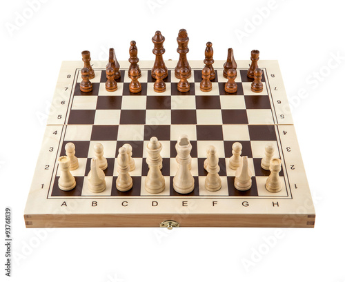 Chess board with chess wooden pieces isolated on white