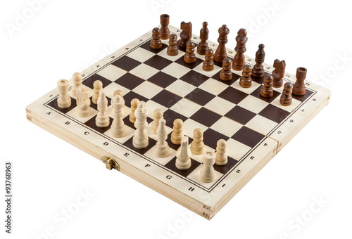 Chess board with chess wooden pieces isolated on white