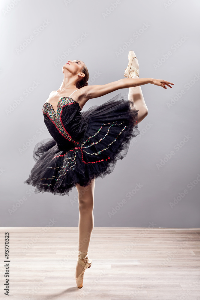 Naklejka premium beautiful ballerina in point technique