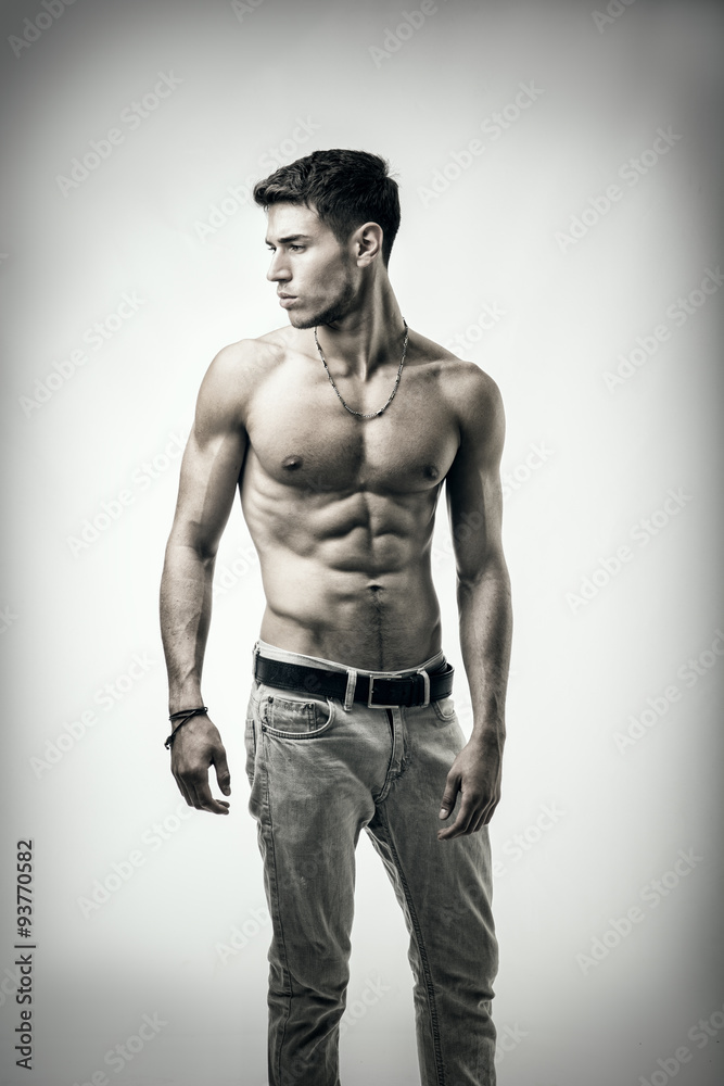 Handsome shirtless athletic young man on white Handsome shirtless athletic young man on white