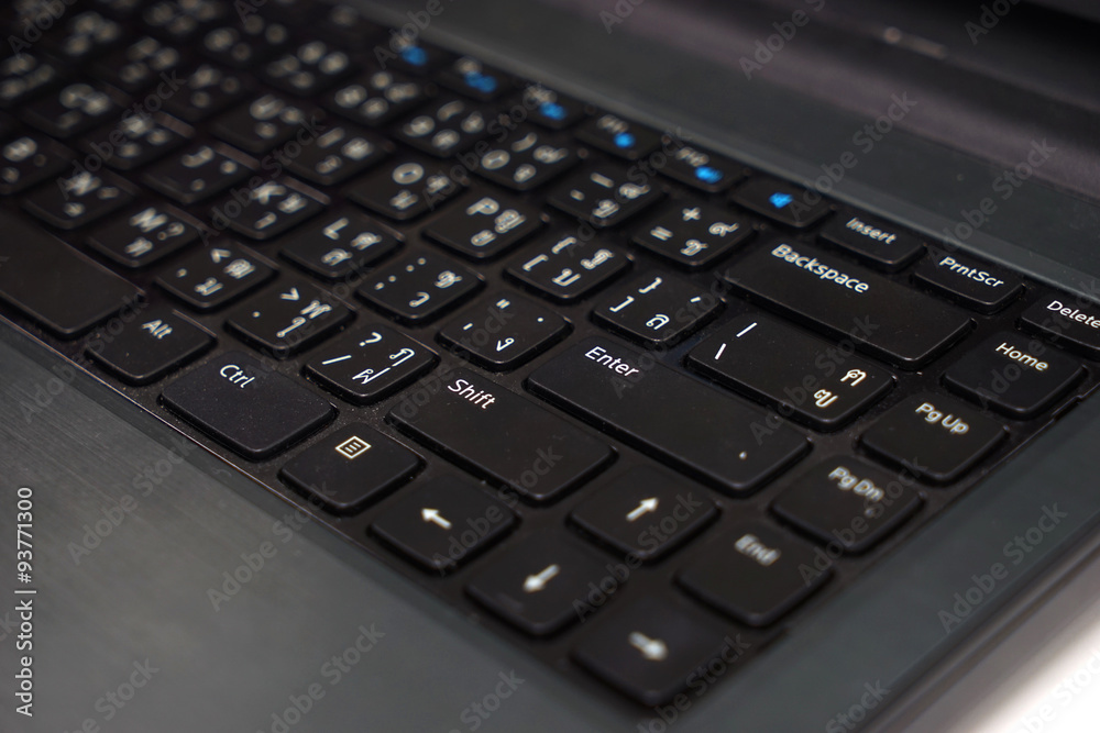 black laptop keyboard on desk