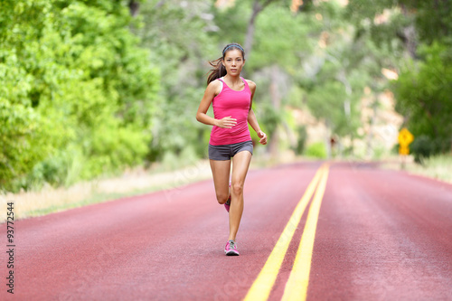 Running fit woman - female runner training © Maridav