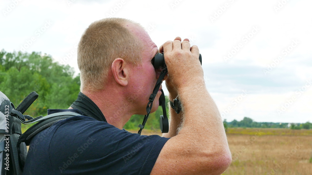 Man tourist looks in binocular in outdoor place. 4K 3840x2160
Man tourist looks in binocular in outdoor place. 4K 3840x2160