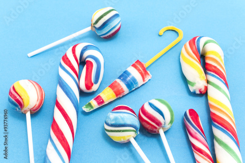 Vintage lollipops on a blue background