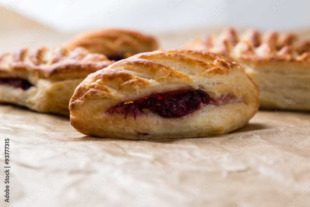 puff pastry with jam on paper