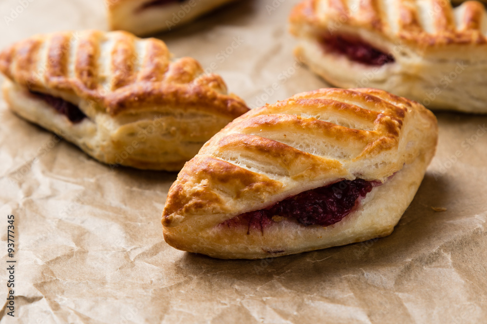 puff pastry with jam on paper